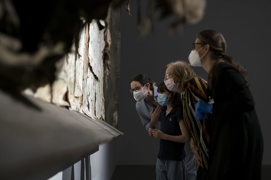 Visitors look at the work of artist Berlinde De Bruyckere at Fondazione Sandretto Re Rebaudengo, a contemporary art foundation in Turin, Italy, on May 23.   