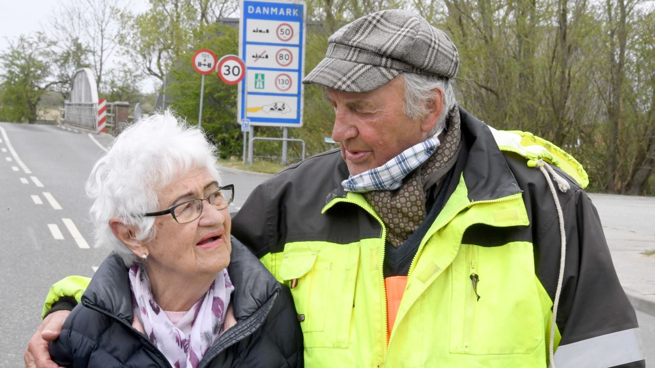 A couple reunites on the German-Danish border. 