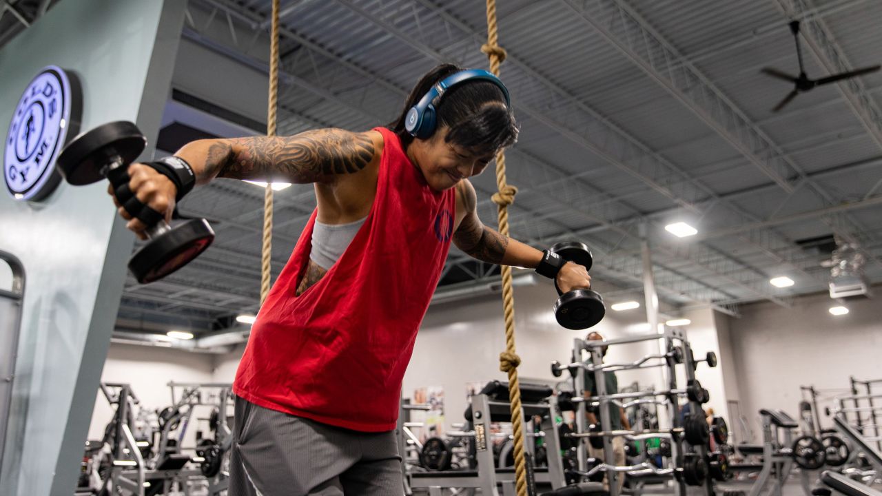 A person exercises at Gold's Gym, one of the businesses that reopened after a coronavirus shutdown, in Augusta, Georgia.