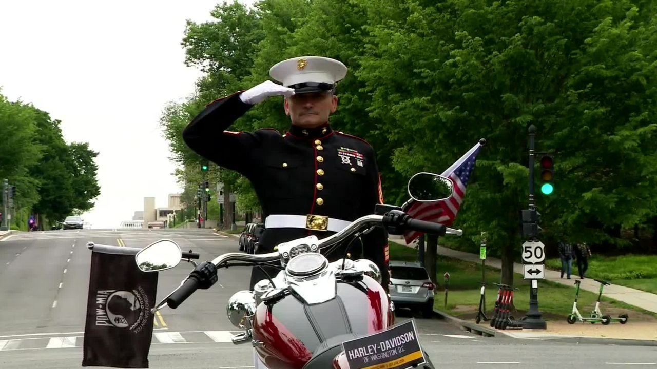 Retired US Marine Corps Staff Sgt. Tim Chambers saluted for 24 hours on a median in Washington on May 24 to raise awareness about veteran suicide.