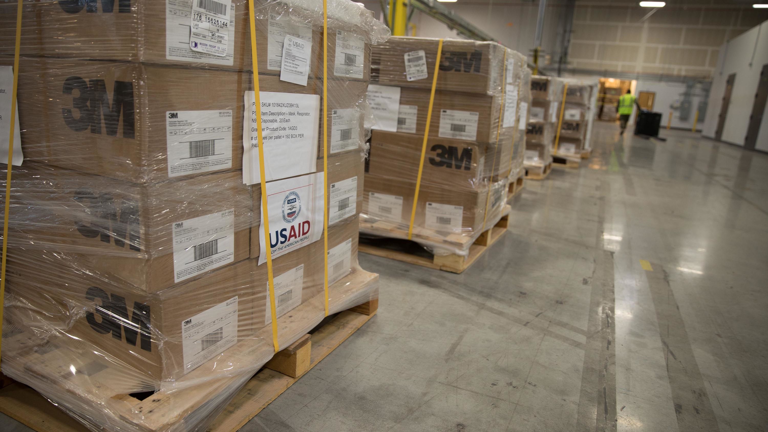 Boxes of personal protective equipment are delivered to a warehouse to be distributed by the Oregon Army National Guard. 