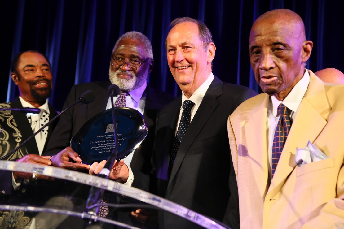 Bill Bradley, third from left, with his former New York Knicks teammates Walt "Clyde" Frazier, Willis Reed and Dick Barnett  in 2018.