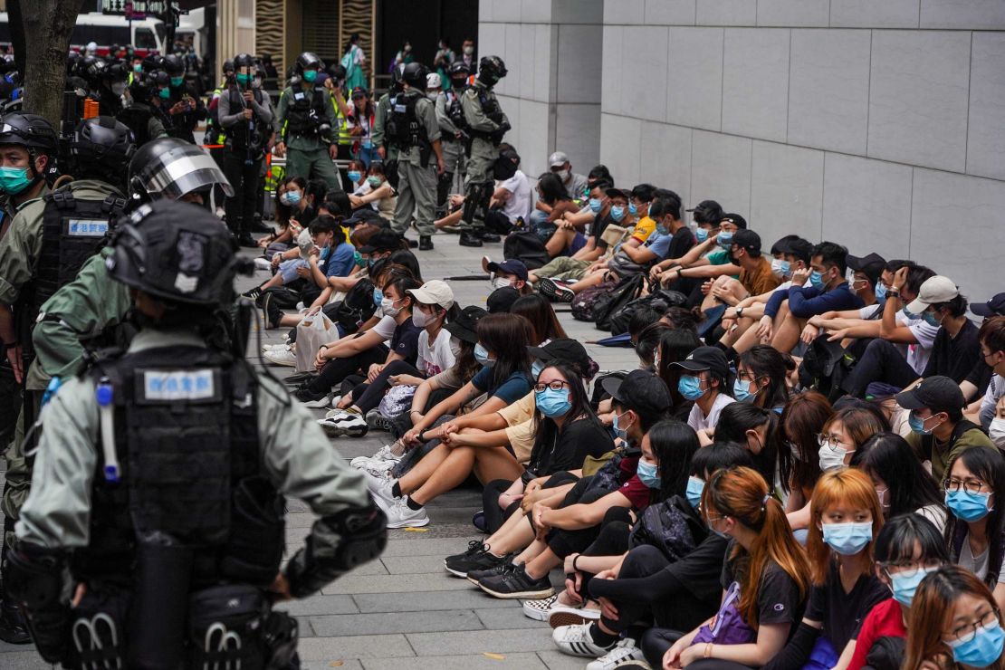 Protesters seen held in a police kettle during a protest in Causeway Bay, Hong Kong. 