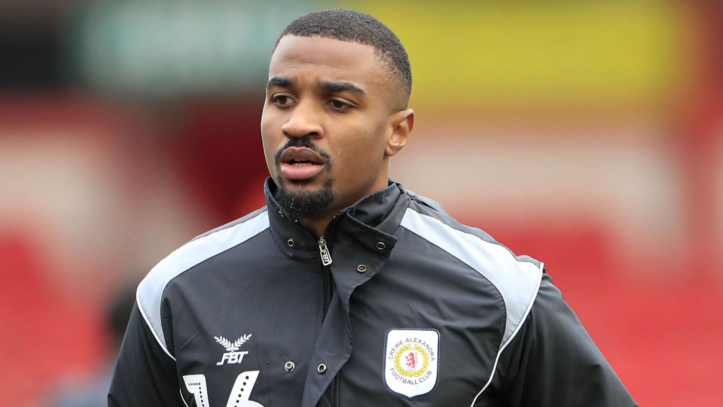 Professional footballer Christian Mbulu, playing here for Crewe, dies aged 23.