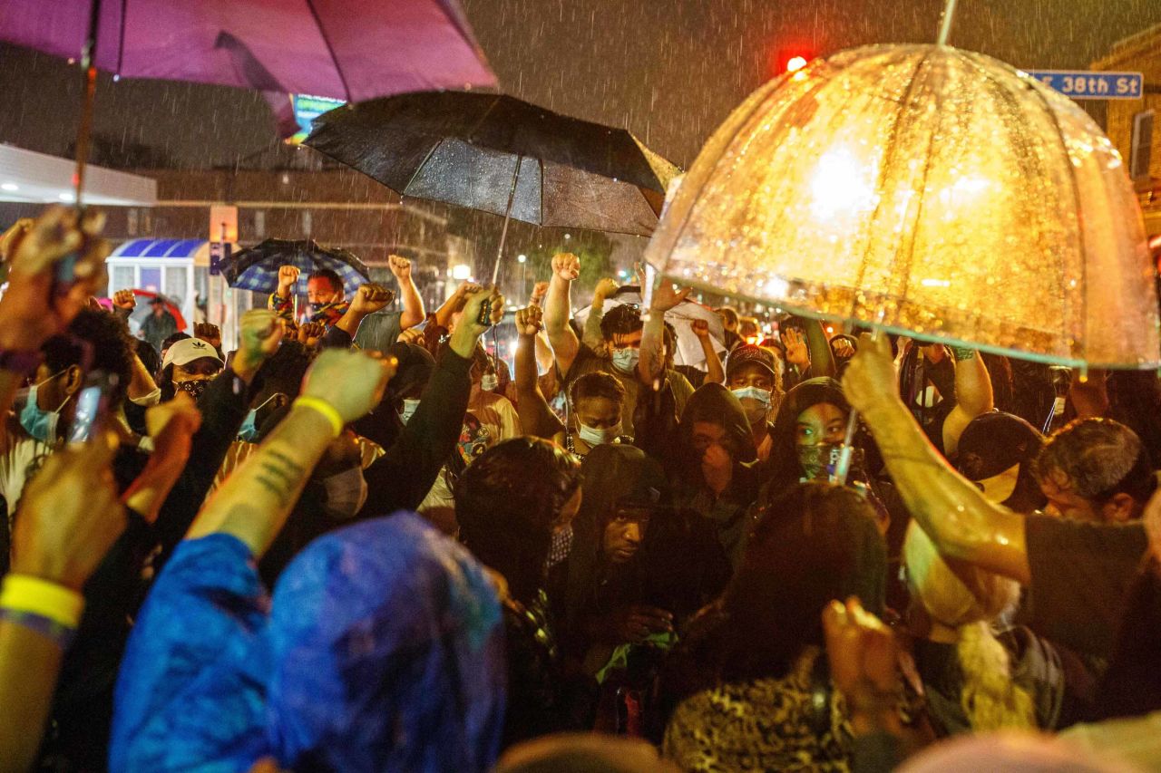 Minneapolis protesters gather in the rain on May 26.