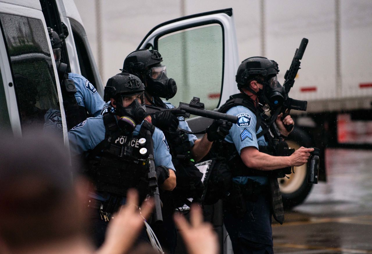 Police try to disperse crowds in Minneapolis on May 26.