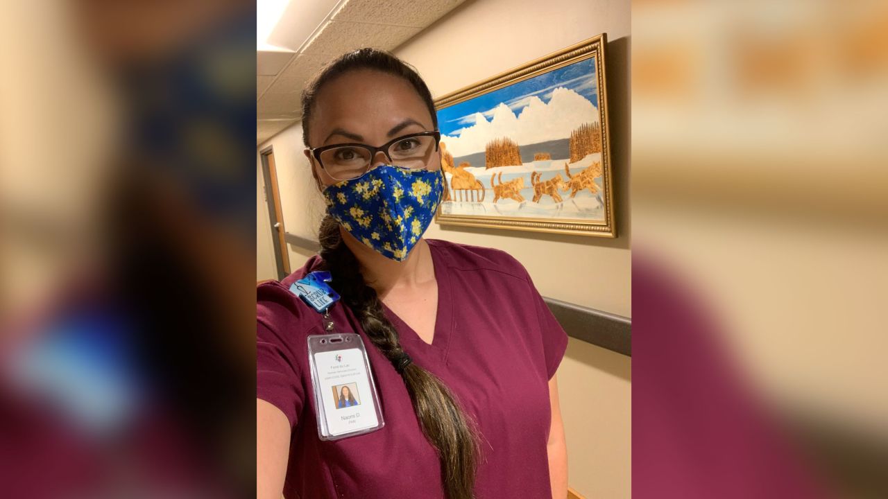 Greensky, an RN, wearing a mask designed and donated by Howes.