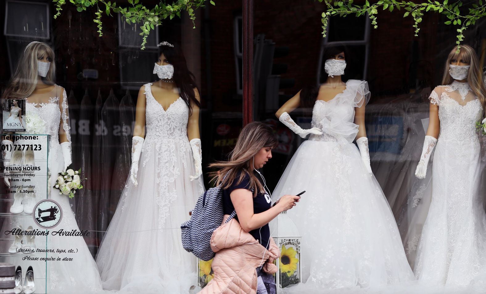 A woman walks past a bridal boutique in Dublin on May 19.