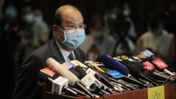 Matthew Cheung, Hong Kong's Chief secretary, wears a protective mask while speaking at a news conference on May 27.