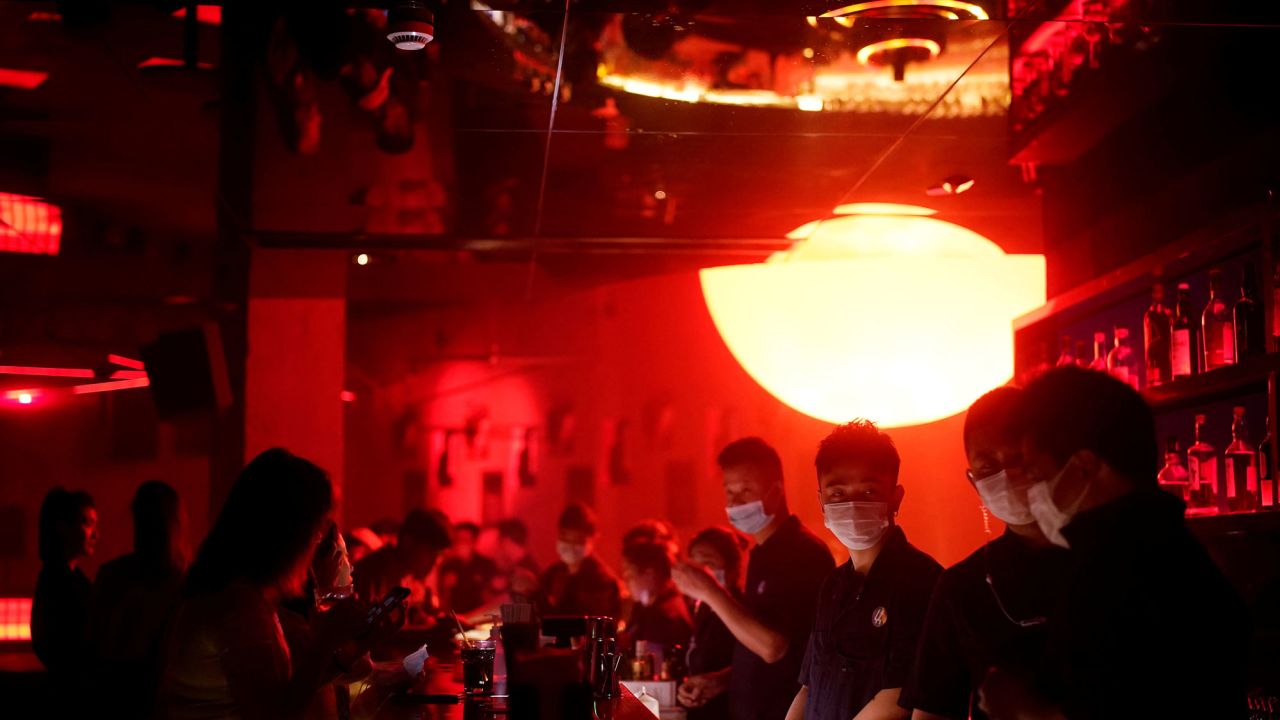 People wear face masks at a nightclub in Shanghai.