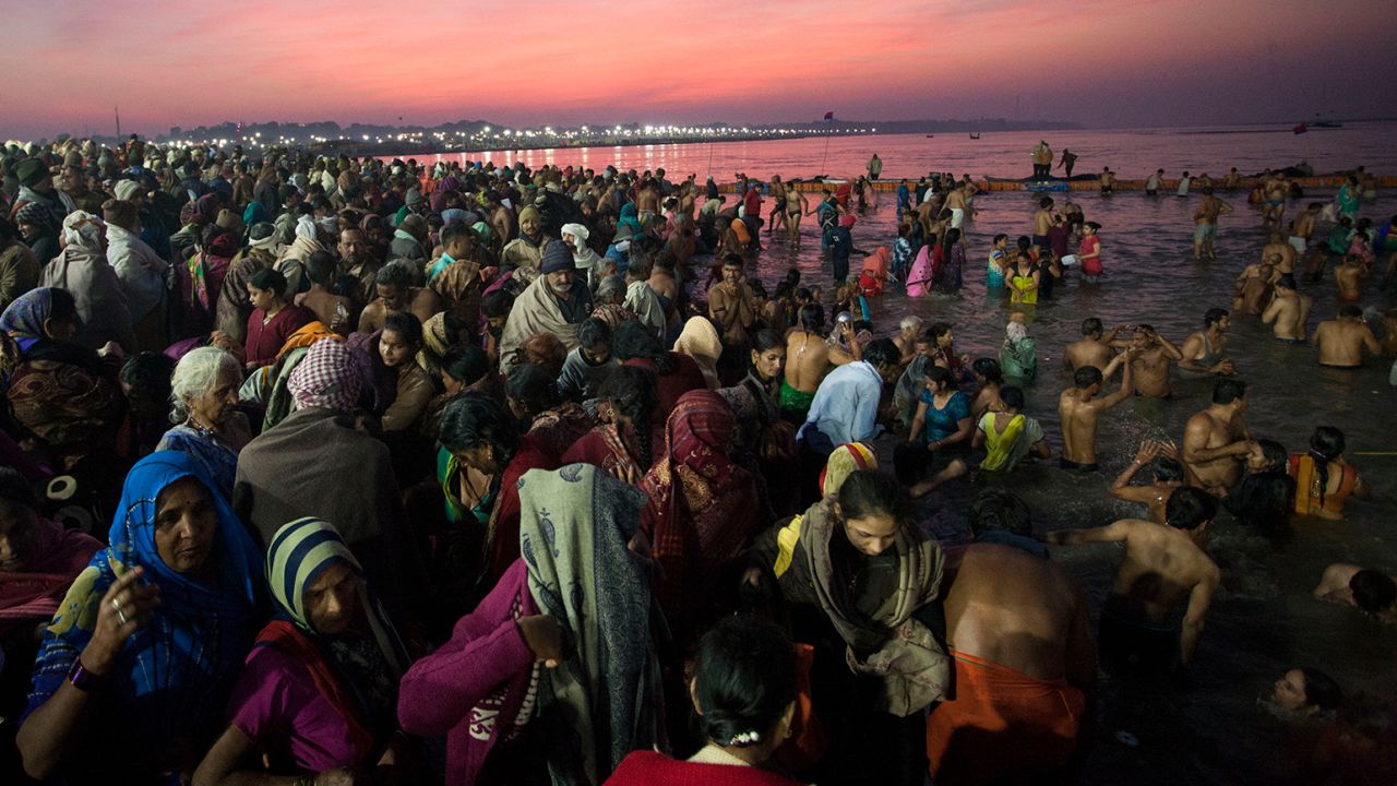 Hindus take a dip in Prayagraj,  where the rivers Ganges, Yamuna and Sarasvati converge.