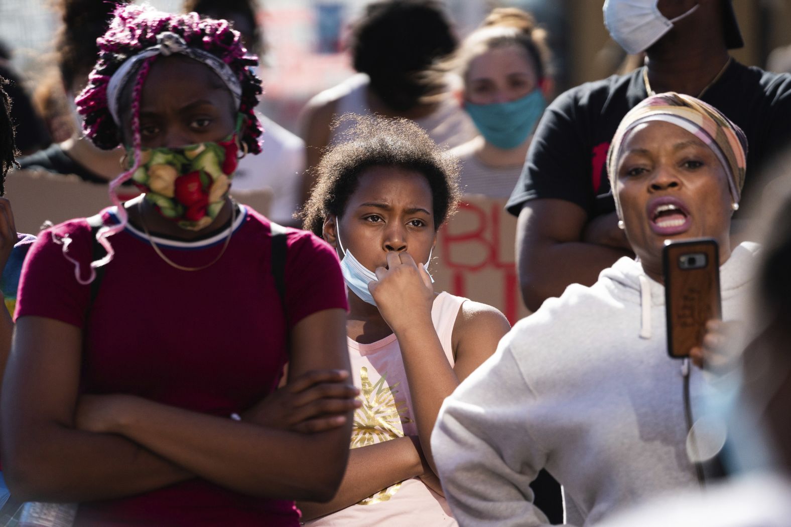 Hundreds of people listen to speakers May 28 outside of Cup Foods in Minneapolis. The neighborhood grocery store is where police first encountered Floyd.