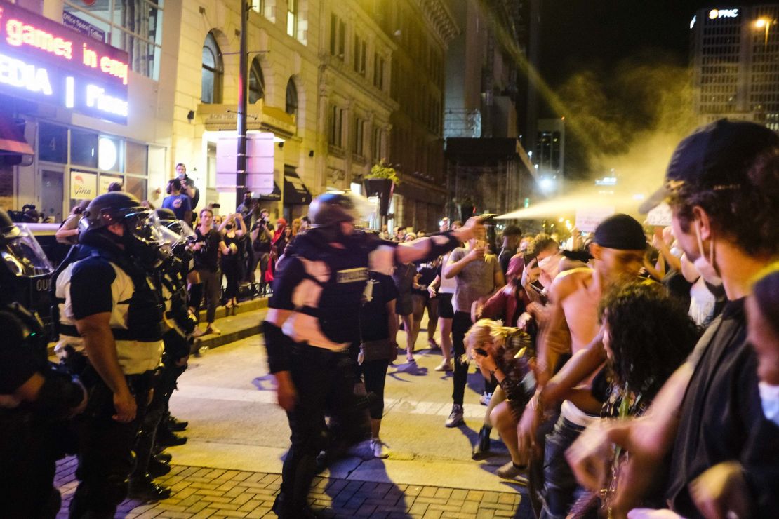 Police pepper spray protesters near the Ohio Statehouse in May.