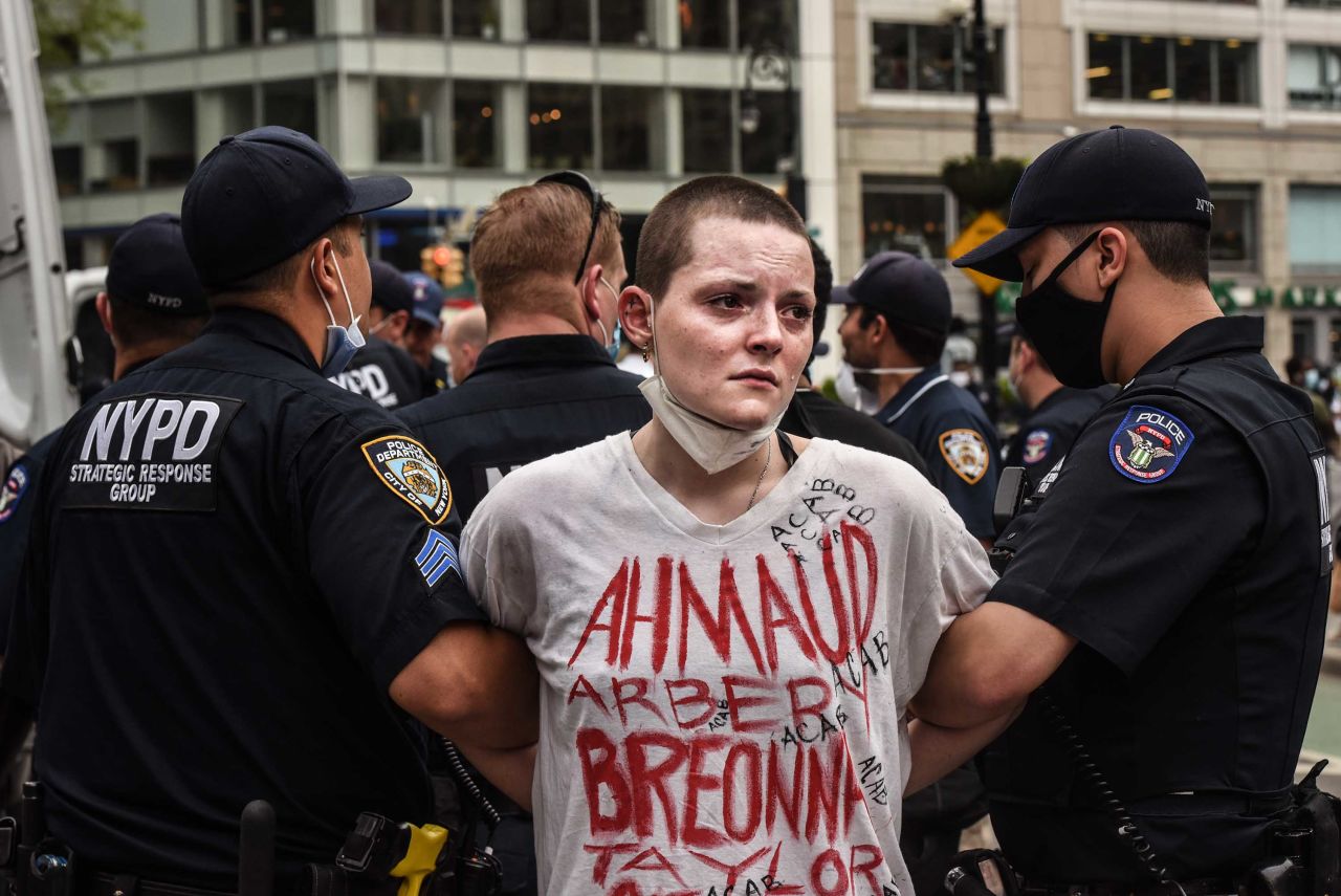 A protester is detained by police during a rally in New York City's Union Square on May 28.