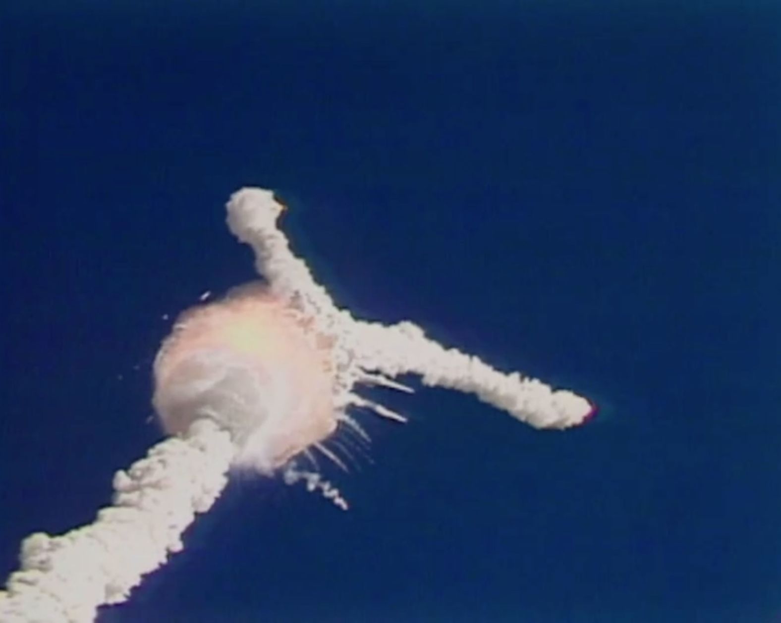 The Space Shuttle Challenger explodes just after takeoff from Kennedy Space Center in Cape Canaveral, Florida, on January 28, 1986. All seven crew members aboard were killed, including Christa McAuliffe, who would have been the first teacher in space. CNN was the only network to broadcast the disaster live.