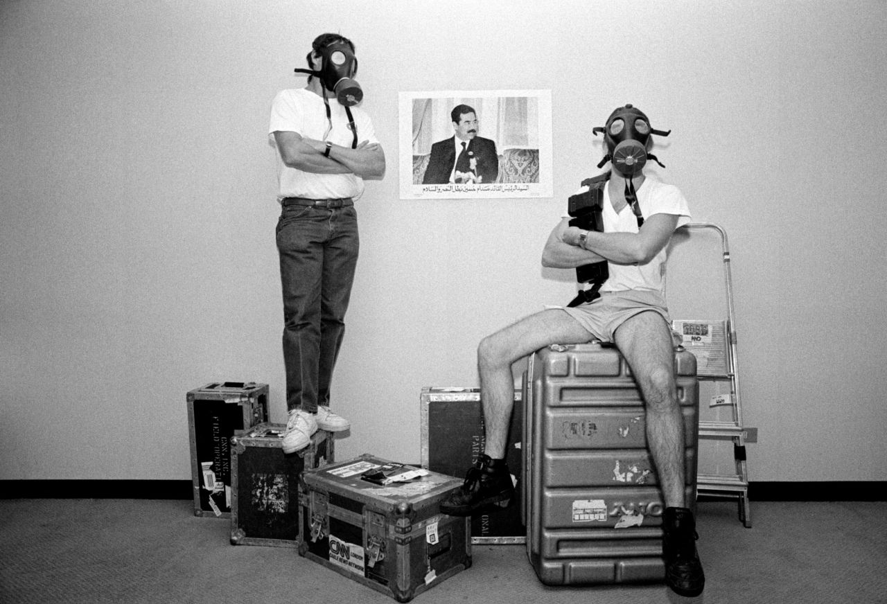 Following Iraq's occupation of Kuwait in August 1990, journalists from CNN pose as they await an attack on Iraq by United Nations-authorized military coalition forces at a hotel in Amman, Jordan, in December 1990.