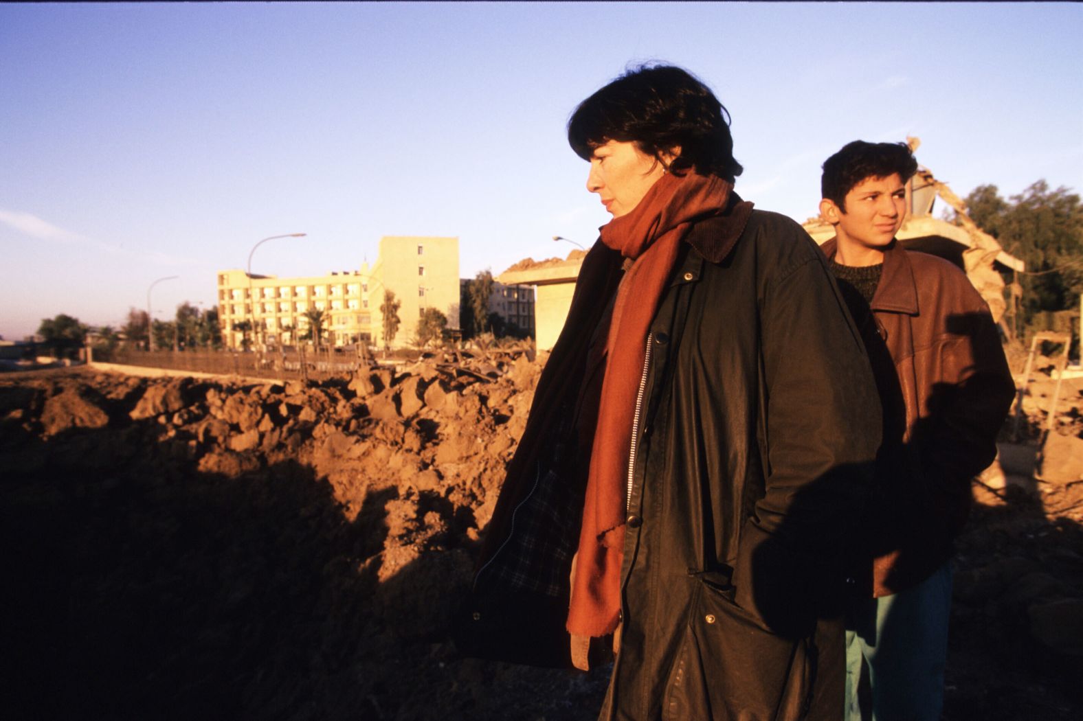 CNN's Chief International Correspondent Christiane Amanpour examines a crater left by a US bombing in Baghdad, Iraq, in December 1998.