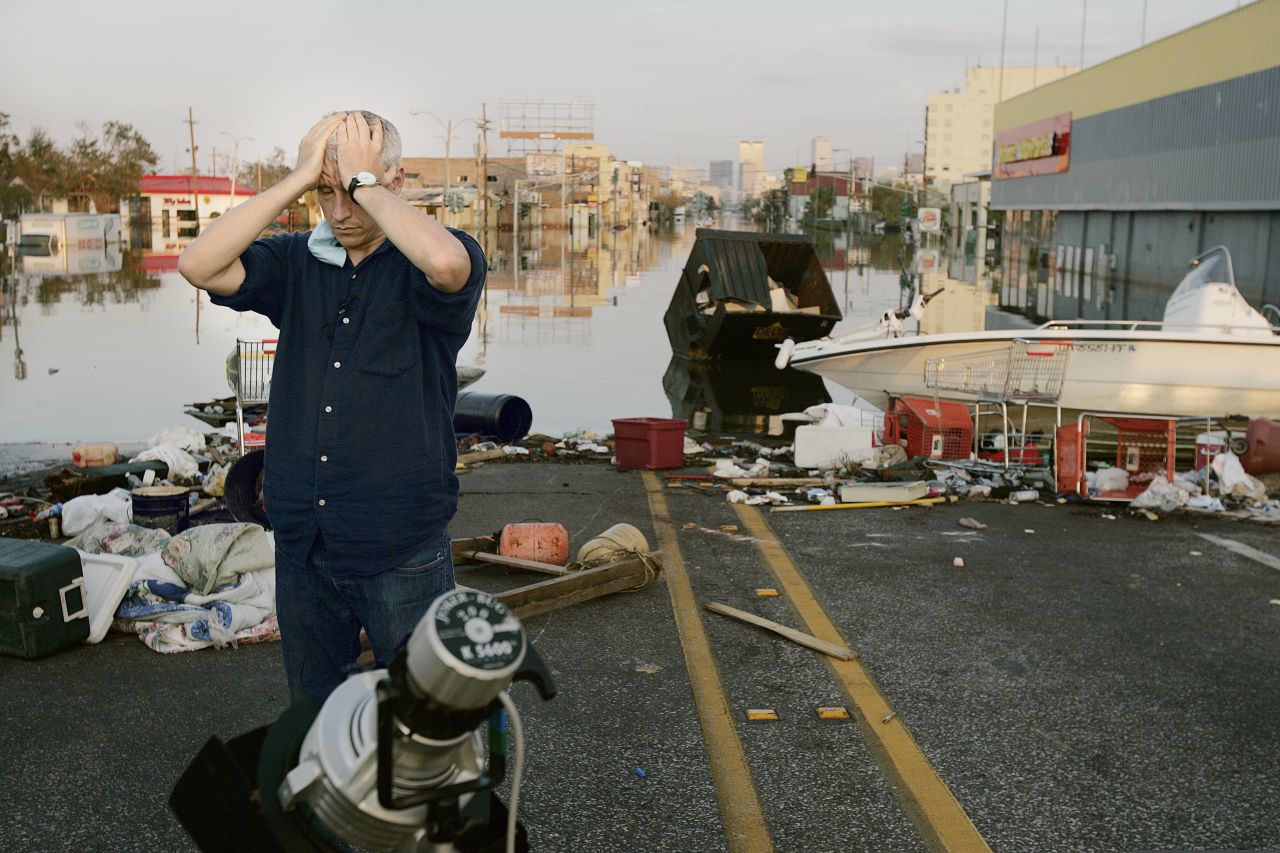 Anderson Cooper covers the aftermath of Hurricane Katrina in New Orleans in 2005. "It's a horrible story to cover," an emotional Cooper<a href="https://nymag.com/nymetro/news/features/14301/" target="_blank" target="_blank"> told New York magazine.</a> "Frankly, I feel privileged to be here."