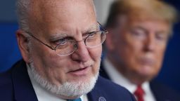 CDC Director Robert Redfield speaks as US President Donald Trump listens during the daily briefing on the novel coronavirus, which causes COVID-19, in the Brady Briefing Room of the White House on April 16, 2020, in Washington, DC. 