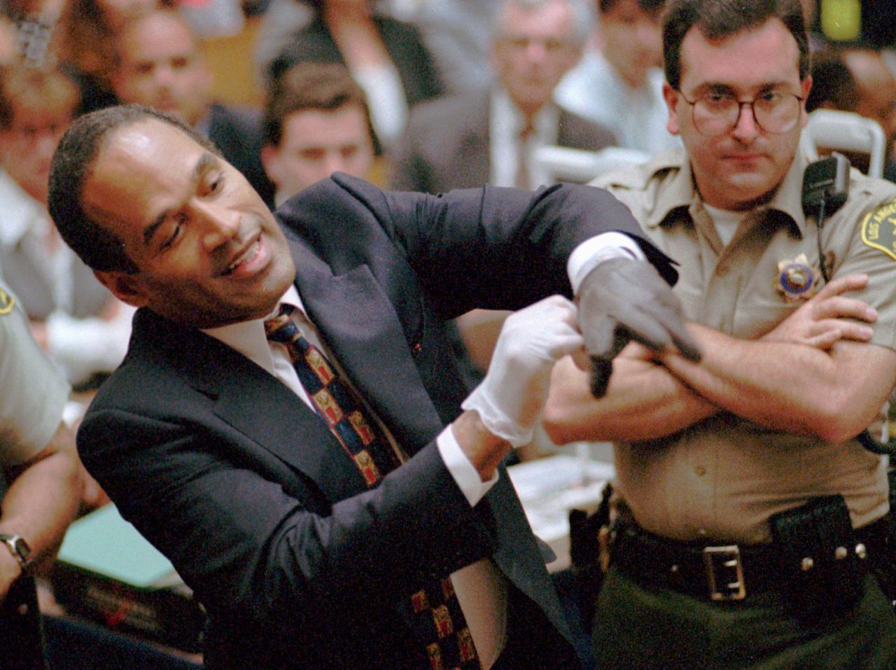 In one of the most memorable moments of a blockbuster murder trial in June 1995, O.J. Simpson struggled to fit his hand into a glove prosecutors claimed he wore the night his ex-wife Nicole Brown Simpson and Ronald Goldman were killed. The prosecution's request to have Simpson try the gloves on in court was a pivotal moment in the trial, which ended with the former NFL star's acquittal.