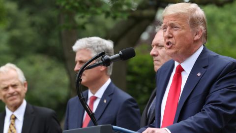 President Donald Trump is flanked by administration officials while speaking about U.S. relations with China in the Rose Garden at the White House May 29, 2020 in Washington, DC. (Photo by Win McNamee/Getty Images)