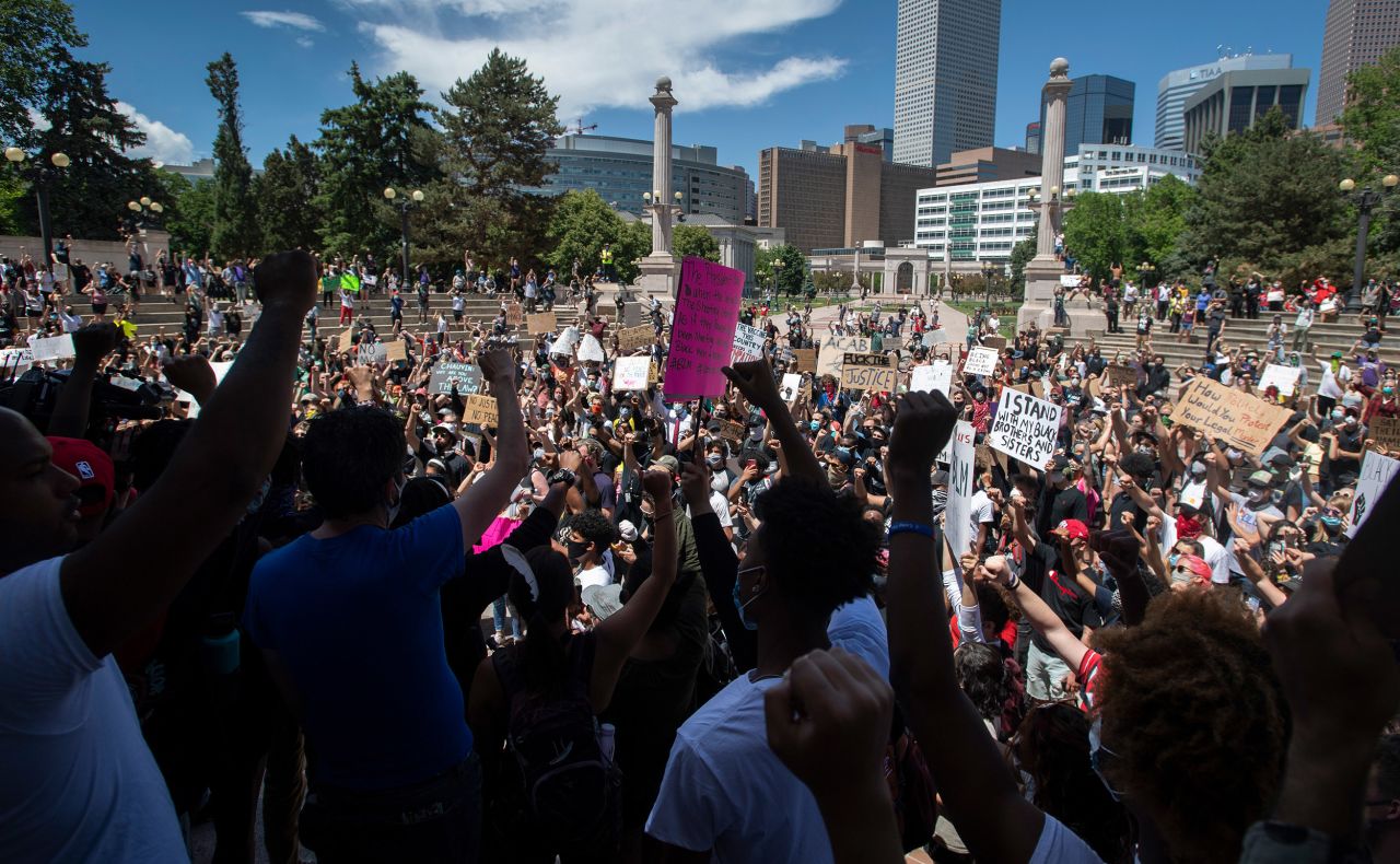 Protesters chant in Civic Center Park during a rally in Denver on May 29.