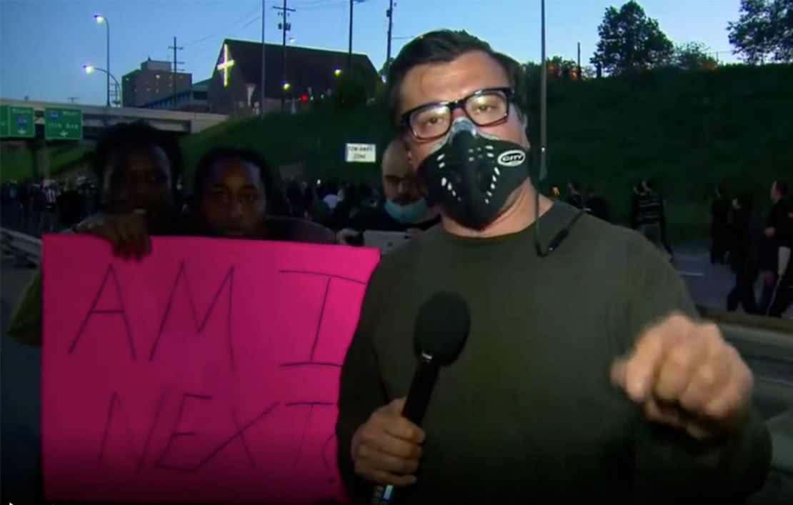 A protester in Minneapolis asks a question many in the crowd have.