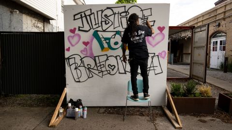 Grafitti artist Resko painting a mural in honor of Breonna Taylor for a protest march held May 29, 2020 in Louisville, Kentucky.  