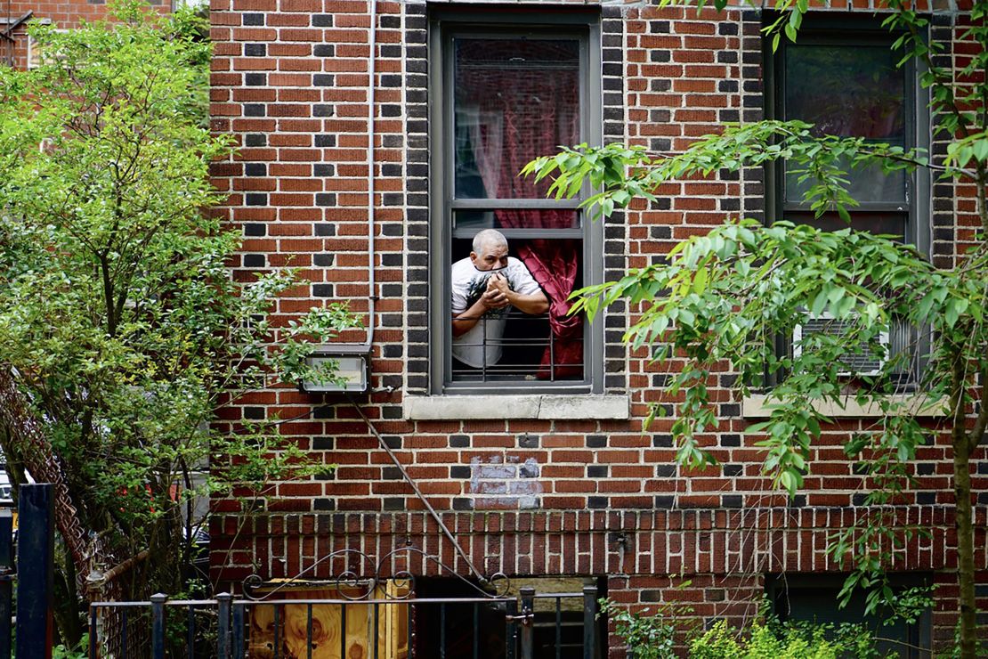 Neighbors kept their distance, paying their respect to Carlos and Lordes Coronal from their apartment windows, as the van carrying the two coffins stopped in front of the family home in Brooklyn, New York.