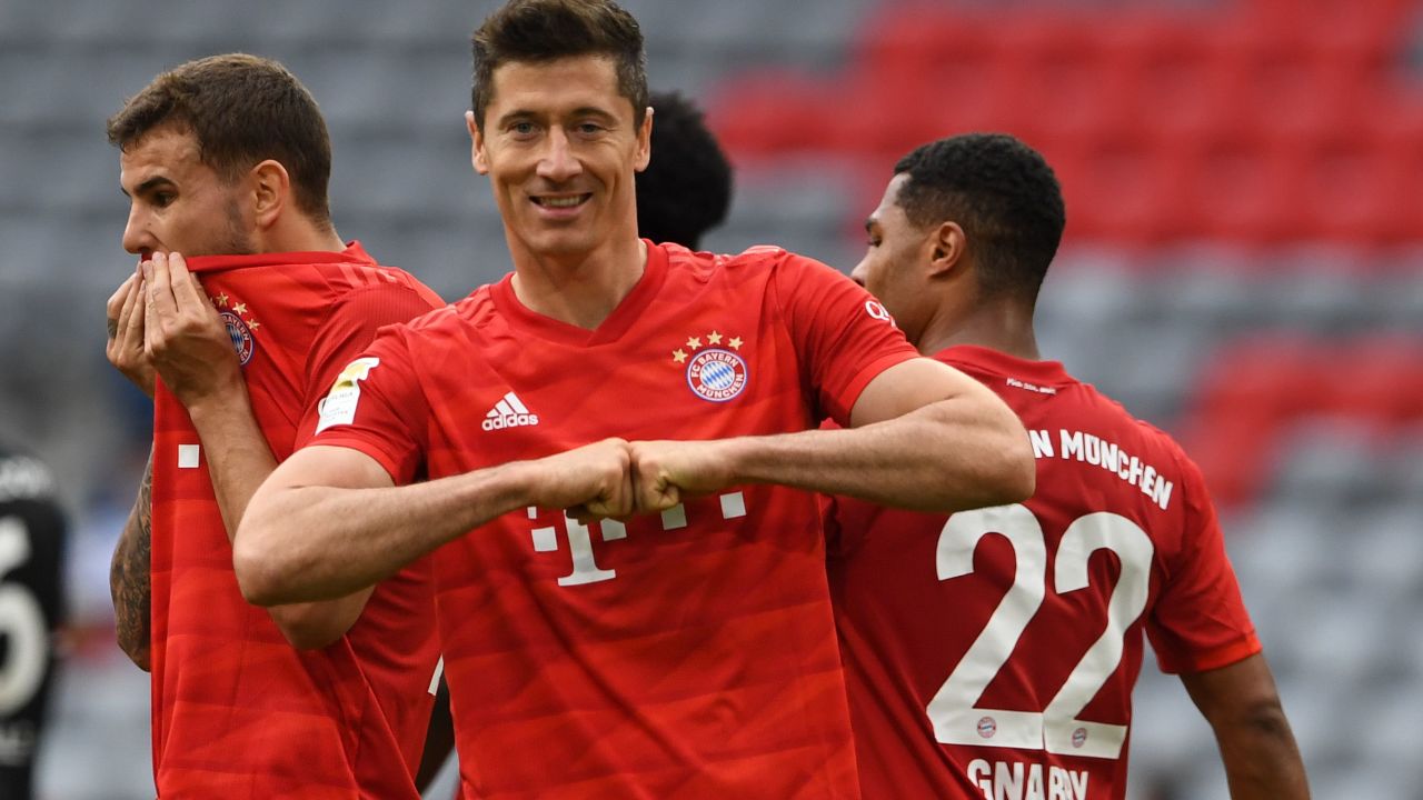 Bayern Munich's Polish forward Robert Lewandowski celebrates his opener and his side's third in the 5-0 rout of Fortuna Dusseldorf.