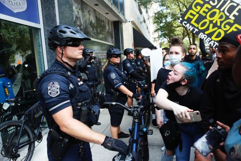 A protester confronts a police officer in Tampa, Florida, on May 30.