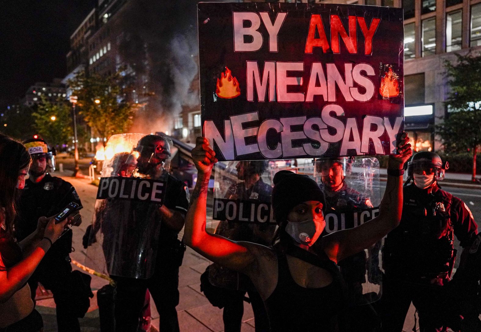 Shaynna Ford stands in front of police in Washington, DC, on May 30.