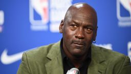 Former NBA star and owner of Charlotte Hornets team Michael Jordan looks on as he addresses a press conference ahead of the NBA basketball match between Milwaukee Bucks and Charlotte Hornets at The AccorHotels Arena in Paris on January 24, 2020.