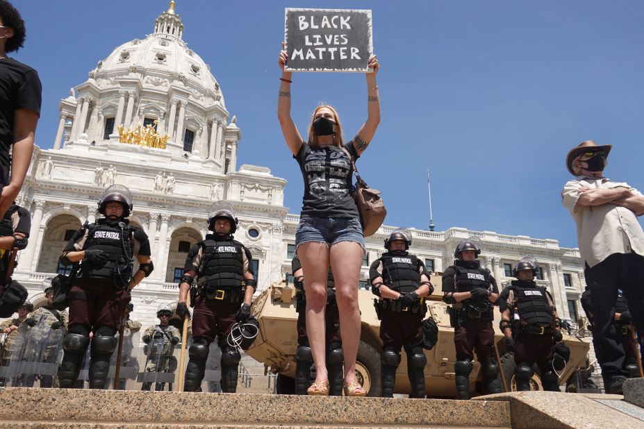 People demonstrate outside the Minnesota Capitol, which was ringed with state troopers and the National Guard on May 31.