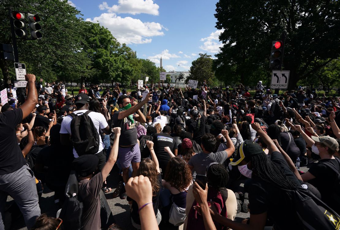 Demonstrators gather near the White House on Sunday.