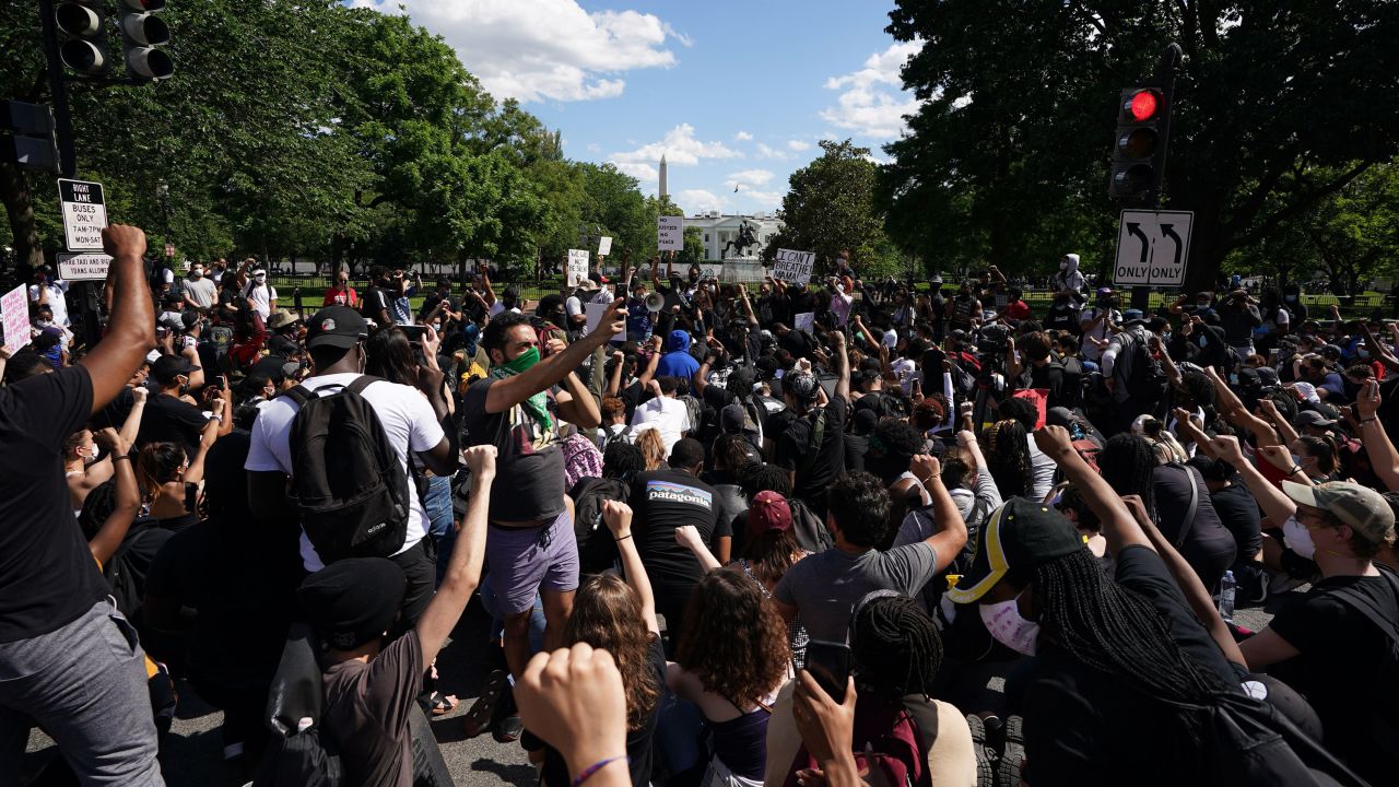 Demonstrators gather near the White House on Sunday.