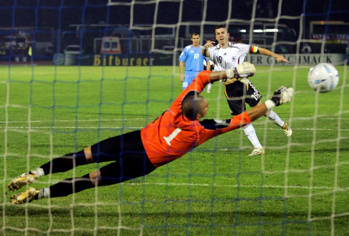 Bernd Schneider makes it 13-0, scoring a penalty past San Marino goalkeeper Aldo Simoncini.