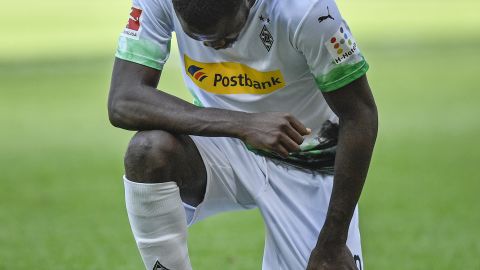 Borussia Mönchengladbach's Marcus Thuram Moenchengladbach's Marcus Thuram takes a knee after scoring Union Berlin at Borussia-Park on May 31, 2020.