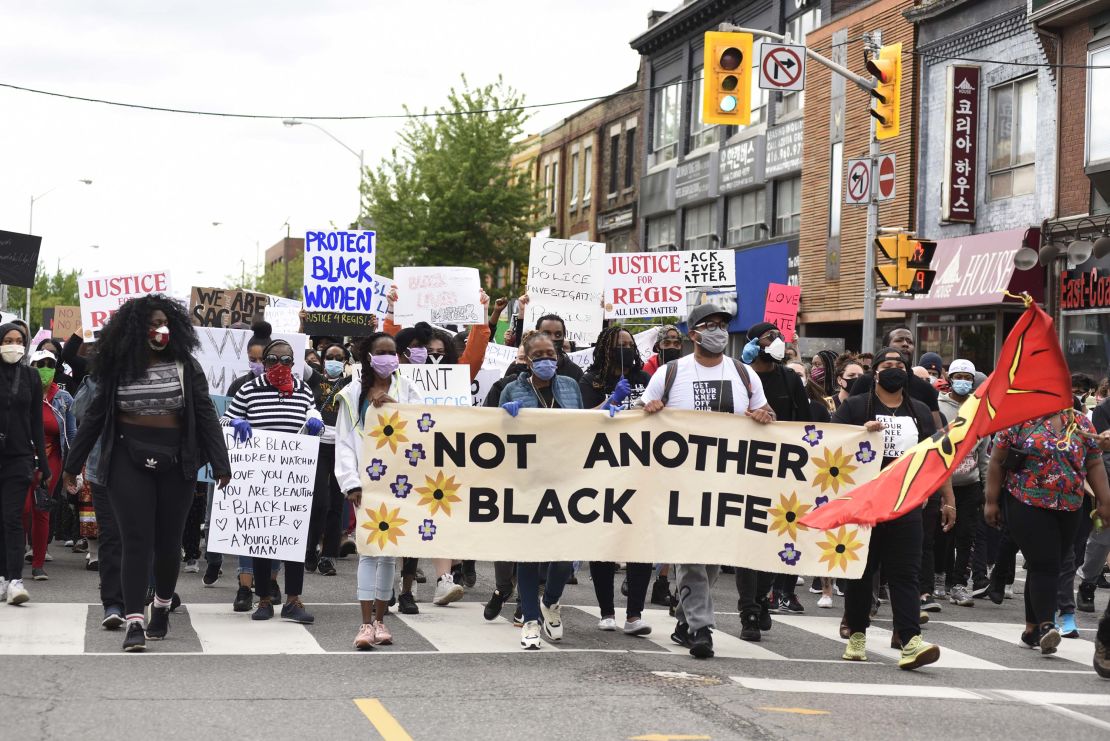 Protesters chanting slogans during a rally in Toronto on Saturday, May 30.