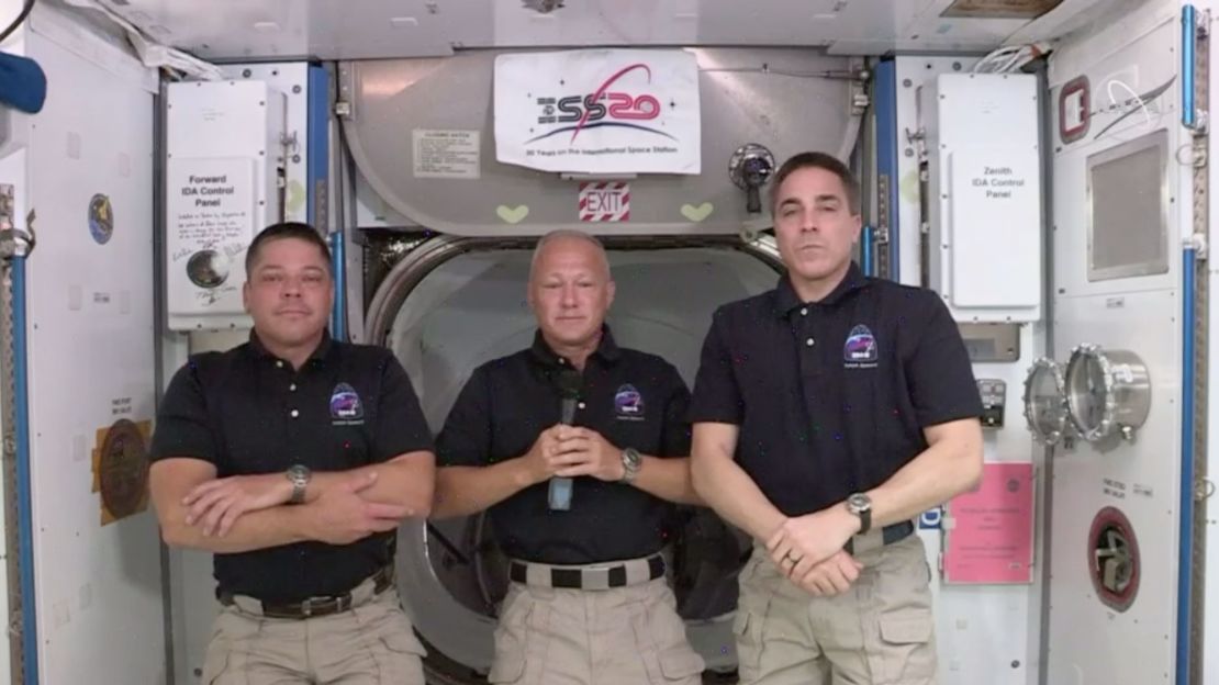 NASA astronauts Bob Behnken, Doug Hurley and Chris Cassidy (pictured from left) spoke from the International Space Station on Monday.