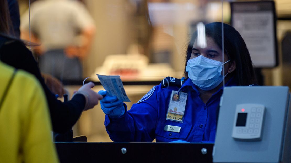 A passenger at Pittsburgh International Airport travels through security on May 7, 2020.