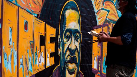 A group of artists painted a mural of George Floyd on the wall outside Cup Foods days after he died.
