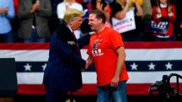 MINNEAPOLIS, MN - OCTOBER 10: U.S. President Donald Trump shakes hands with Minneapolis Police Union head Bob Kroll on stage during a campaign rally at the Target Center on October 10, 2019 in Minneapolis, Minnesota. The rally follows a week of a contentious back and forth between President Trump and Minneapolis Mayor Jacob Frey. (Photo by Stephen Maturen/Getty Images)