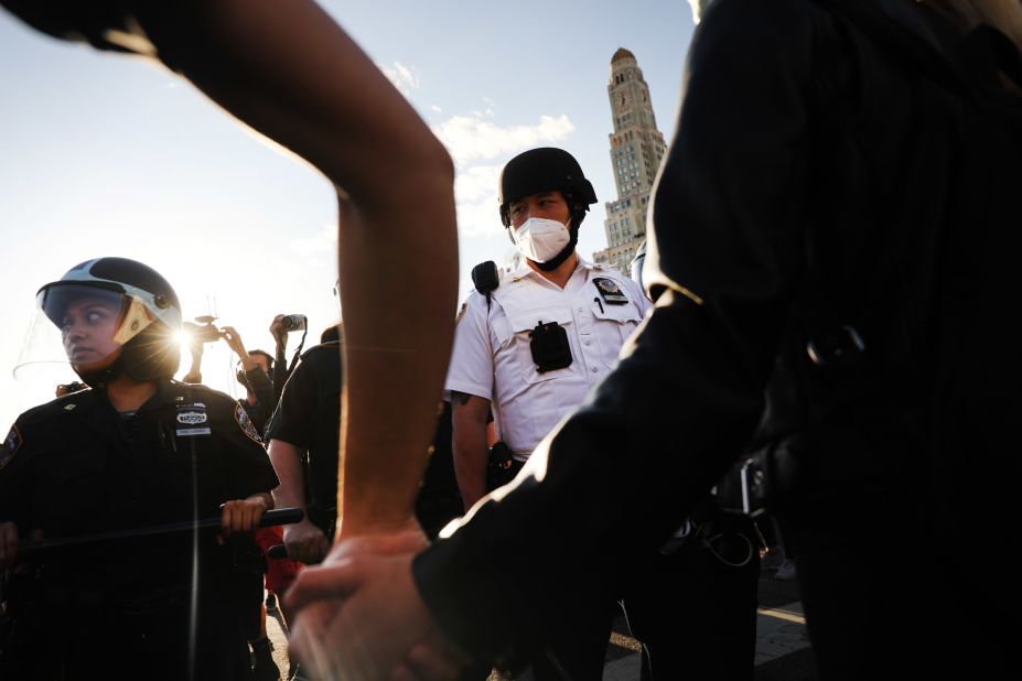Police confront protesters at the Barclays Center in New York on May 31.