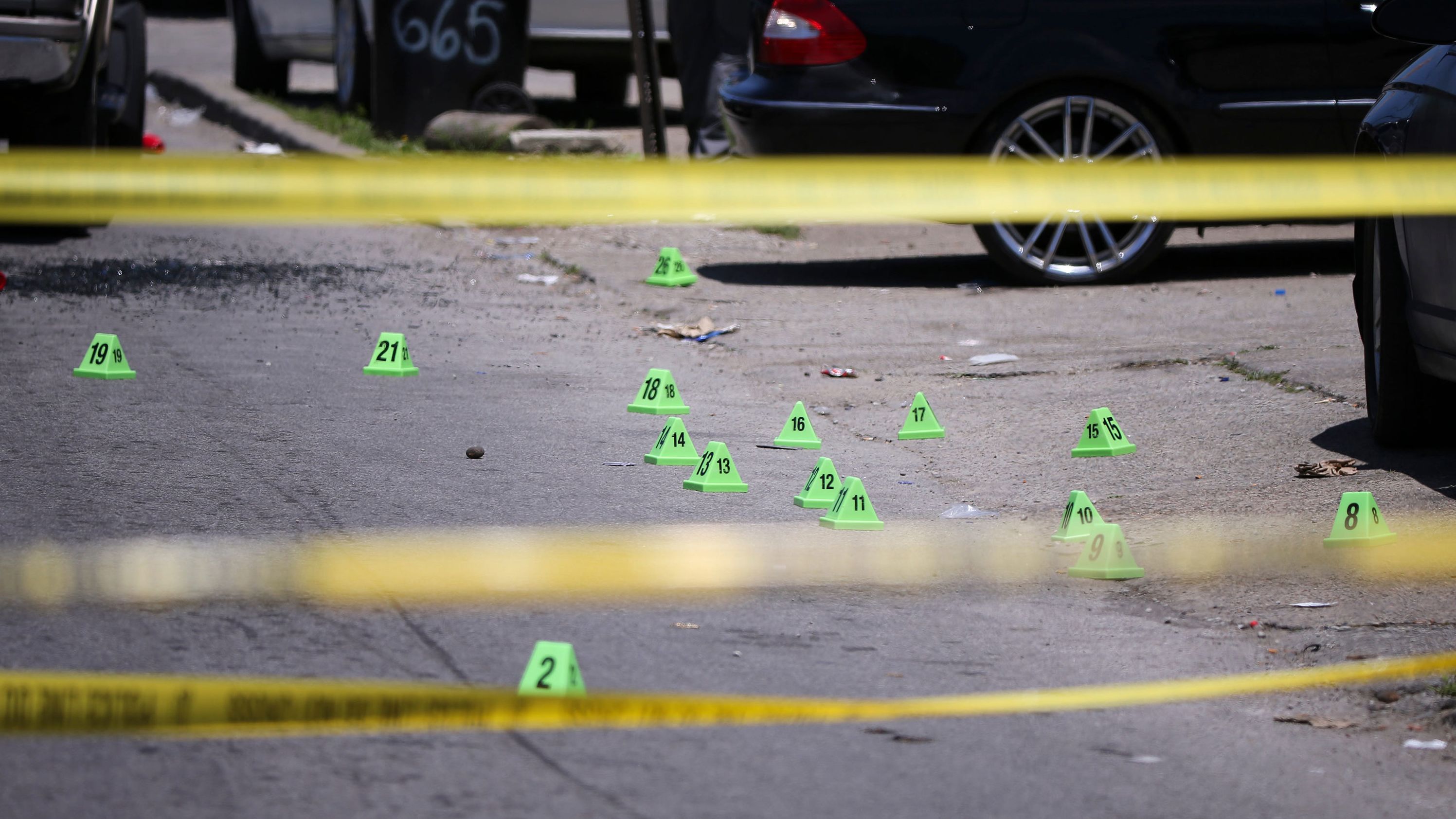 Investigators marked the shell casings after McAtee was shot.