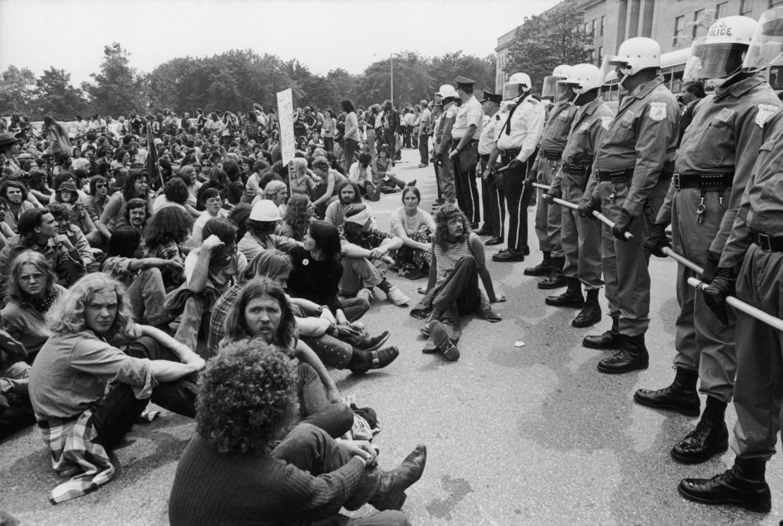 A narrow gap between protesters and riot police during a demonstration against the Vietnam War in Washington, DC, on  May 21, 1972. 173 demonstrators were later arrested during a violent confrontation with the police. 
