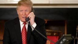 WASHINGTON, DC - DECEMBER 24: U.S. President Donald Trump takes phone calls from children as he participates in tracking Santa Claus' movements with the North American Aerospace Defense Command (NORAD) Santa Tracker on Christmas Eve in the East Room of the White House December 24, 2018 in Washington, DC. This is the 63rd straight year that NORAD has publicly tracked Santa's sleigh on its global rounds. (Photo by Chip Somodevilla/Getty Images)