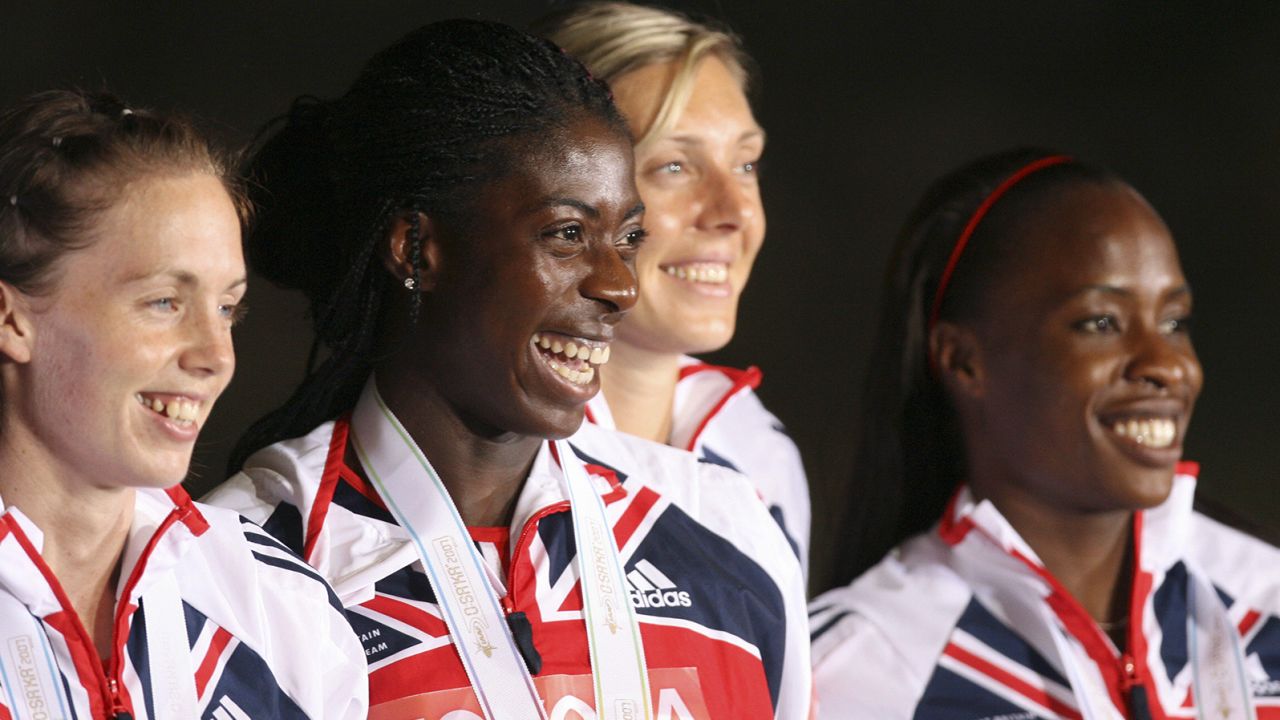 Britain's Lee Mcconnell, Christine Ohuruogu, Nicola Sanders and Okoro celebrate on the podium after the women's 4x400m relay final, 02 September 2007, at the 11th IAAF World Athletics Championships, in Osaka. USA won ahead of Jamaica and Britian.