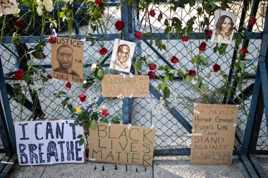 Signs and flowers outside the US embassy in Mexico City.