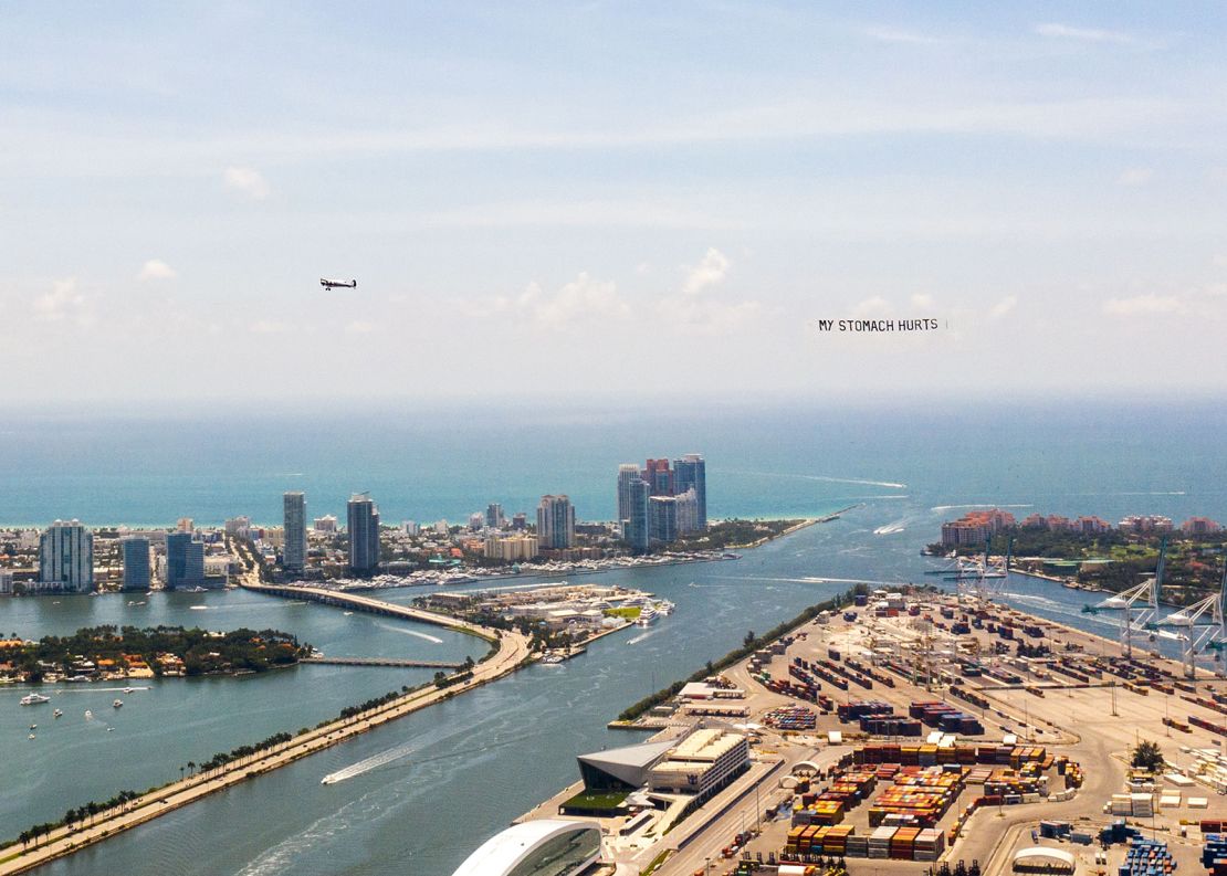 One of the banners pictured trailing an airplane above Miami.